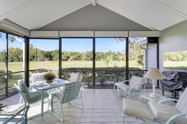 sunroom with lofted ceiling