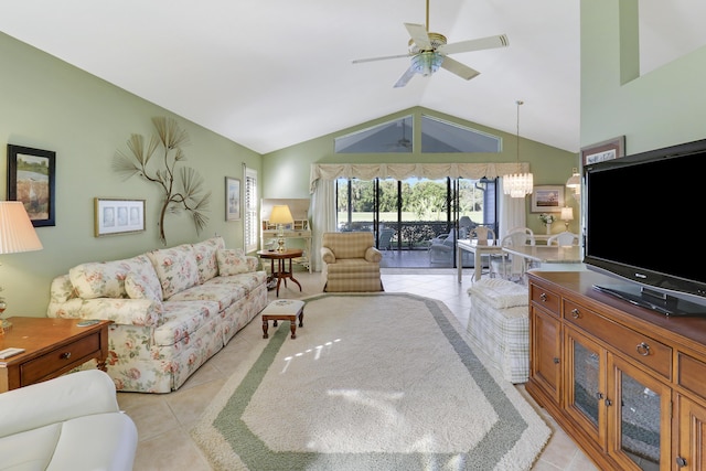 living room featuring light tile patterned floors, vaulted ceiling, and ceiling fan