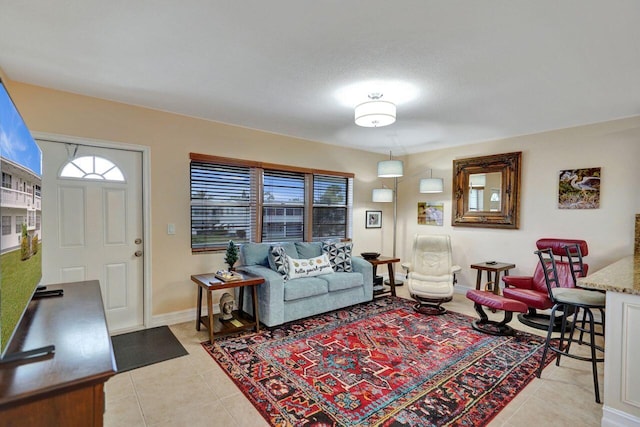 tiled living room with a textured ceiling