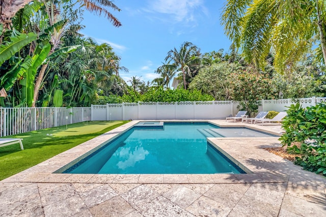 view of pool featuring a patio