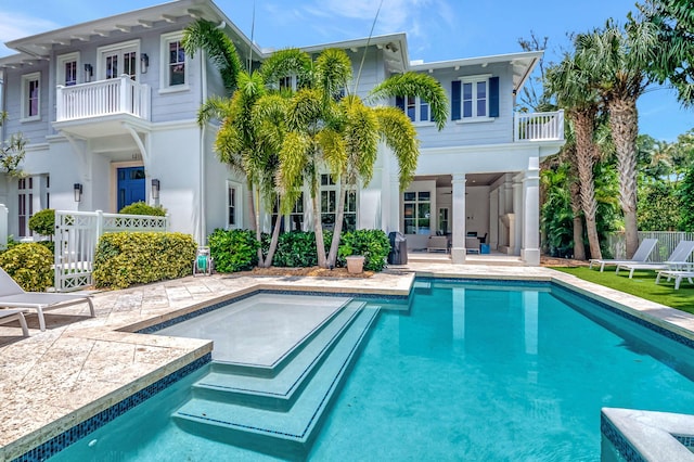 view of pool featuring a patio area