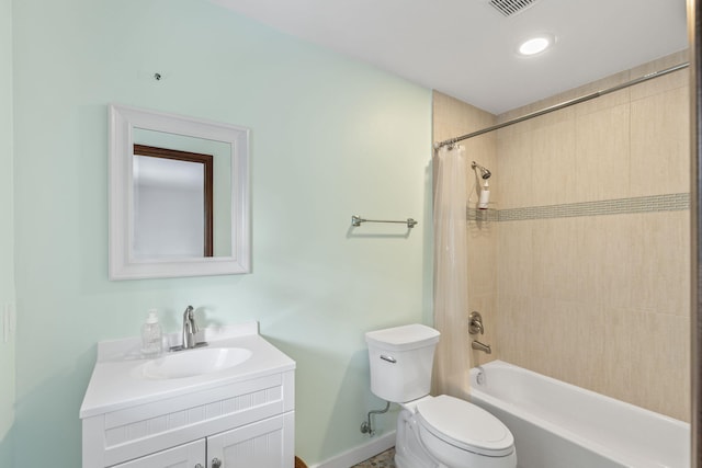 full bathroom with vanity, toilet, and shower / tub combo with curtain