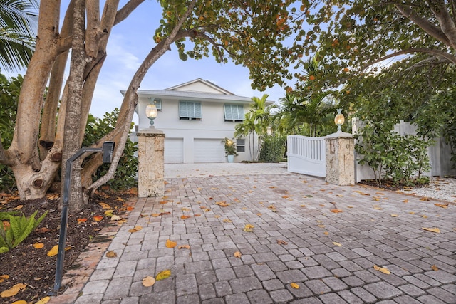 view of front of home with a garage