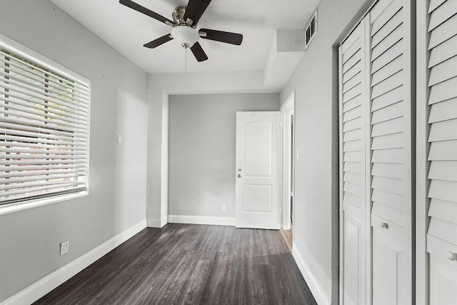 interior space with dark hardwood / wood-style flooring