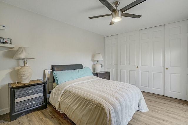 bedroom featuring ceiling fan and light hardwood / wood-style flooring