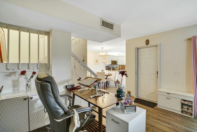 office with dark hardwood / wood-style floors