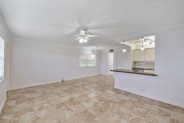 unfurnished living room with a textured ceiling, ceiling fan, and crown molding