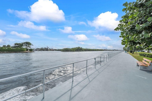 view of dock with a water view