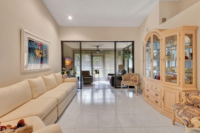 7906 Lexington Club Blvd Unit B, Delray Beach, FL 33446 - living area featuring light tile patterned flooring and a ceiling fan