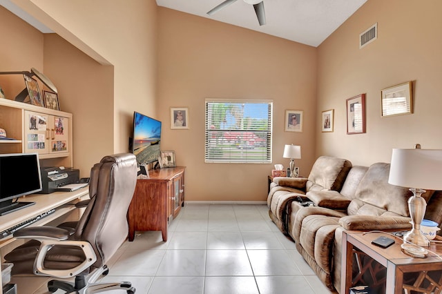 office with ceiling fan, high vaulted ceiling, and light tile patterned floors