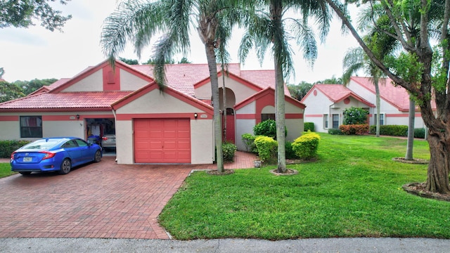 7906 Lexington Club Blvd Unit B, Delray Beach, FL 33446 - view of front of house with decorative driveway, an attached garage, stucco siding, a tile roof, and a front lawn