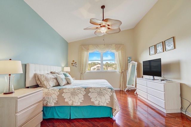 bedroom with hardwood / wood-style floors, ceiling fan, and lofted ceiling