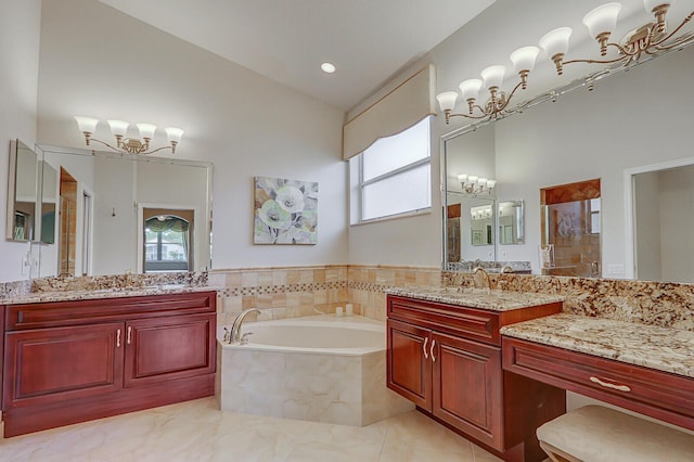 bathroom featuring plus walk in shower and vanity