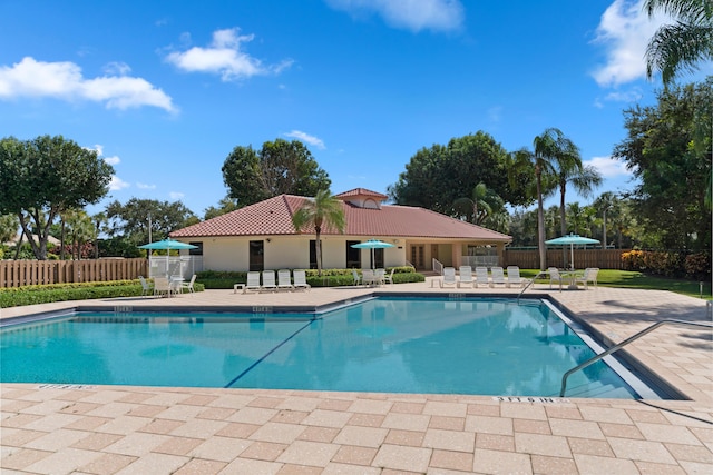 view of pool featuring a patio