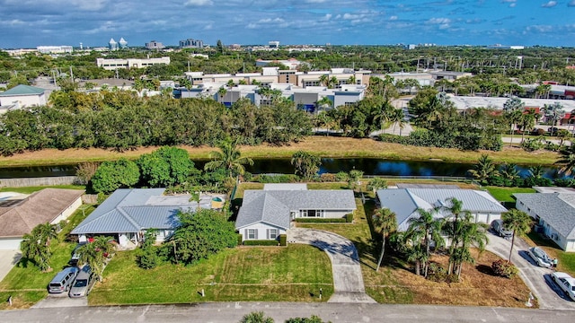 bird's eye view with a water view