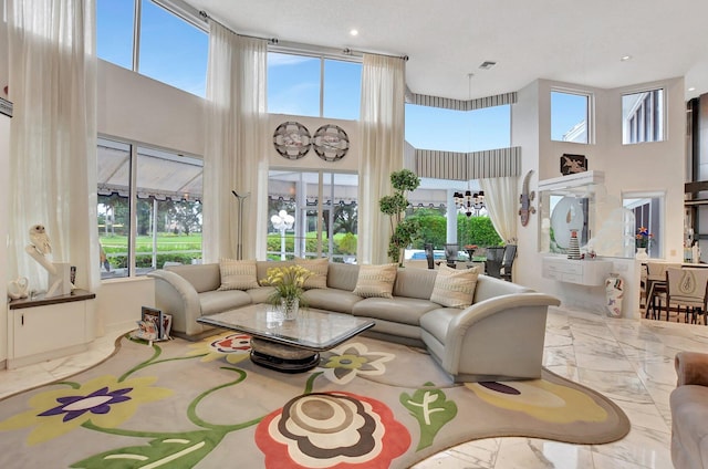 living room with a high ceiling