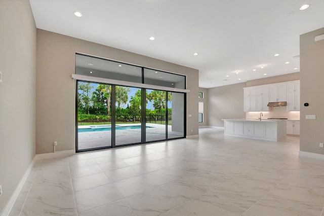 empty room with sink and french doors