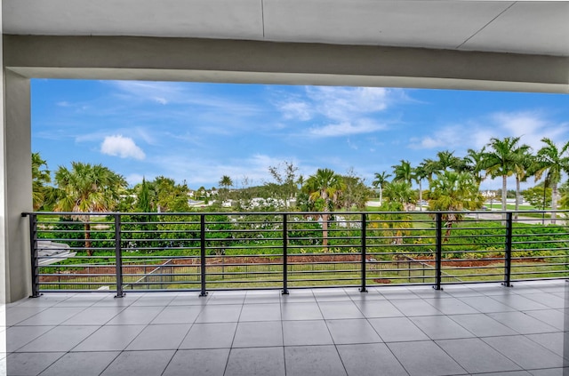 view of patio featuring a balcony