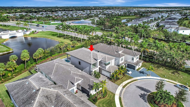 bird's eye view with a water view