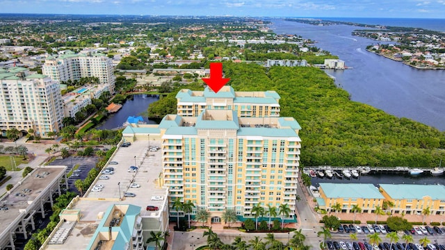 birds eye view of property featuring a water view