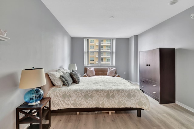 bedroom featuring light hardwood / wood-style floors