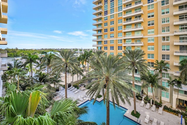 view of swimming pool with a patio