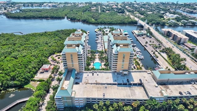 birds eye view of property with a water view