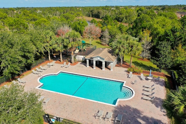 view of swimming pool with a patio area