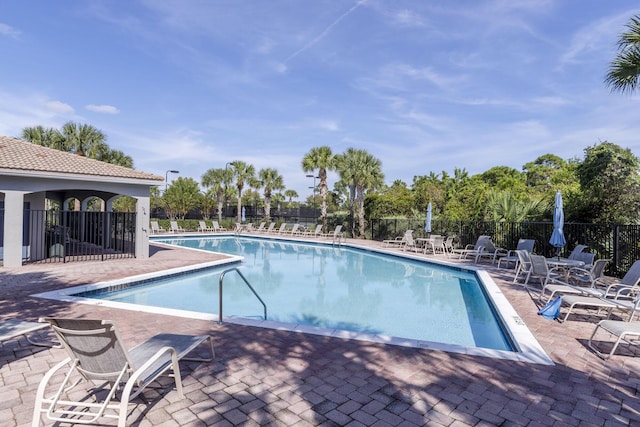 view of swimming pool featuring a patio