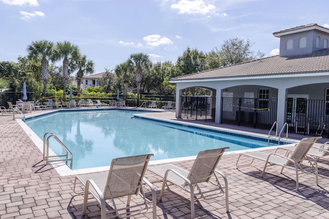 view of pool featuring a patio area