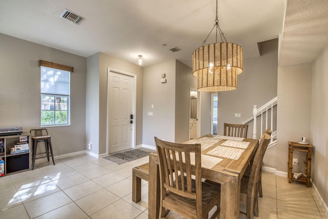 dining room with light tile patterned floors