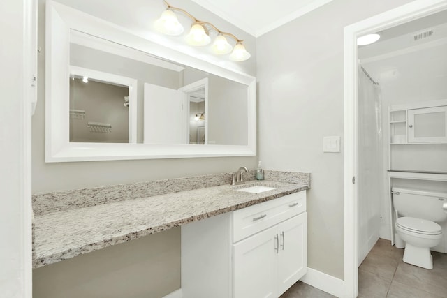 bathroom featuring tile patterned floors, curtained shower, vanity, and toilet