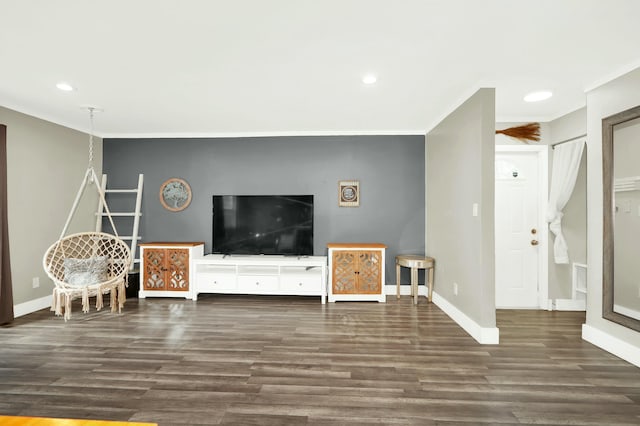 unfurnished living room with dark hardwood / wood-style floors and crown molding