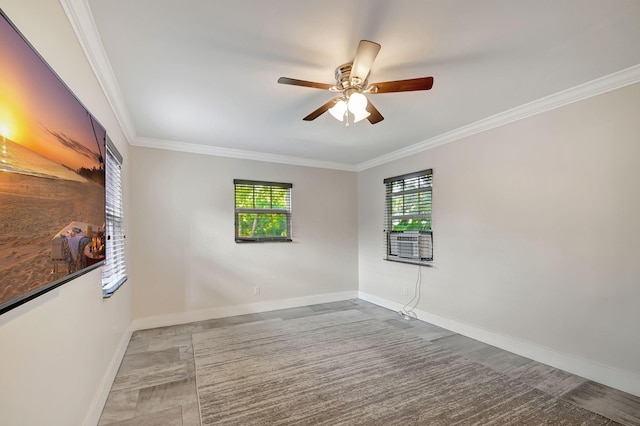 spare room with crown molding and ceiling fan