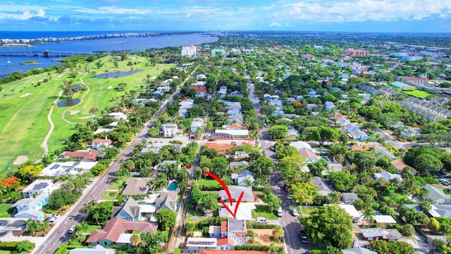 birds eye view of property featuring a water view