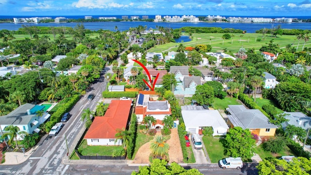 drone / aerial view with a water view