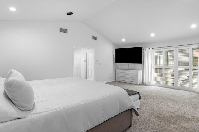 carpeted bedroom featuring vaulted ceiling