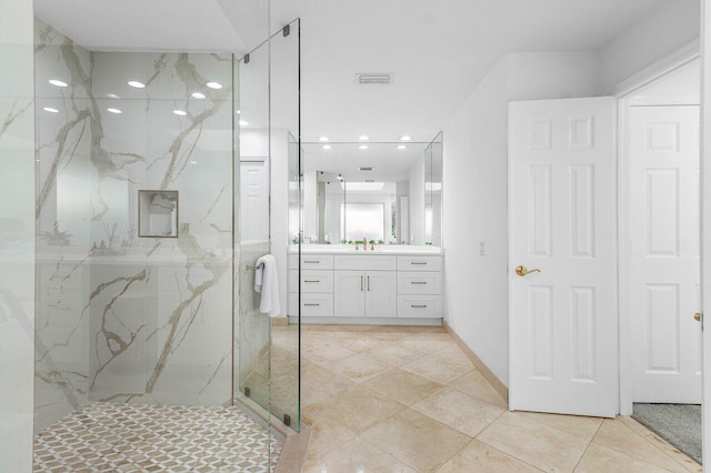 bathroom featuring vanity and walk in shower