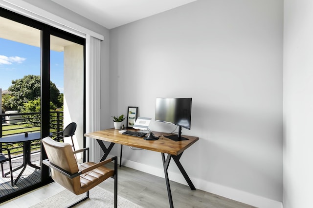 office space featuring light wood-type flooring