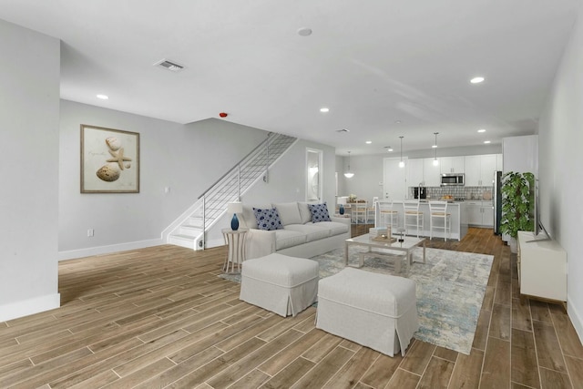 living room featuring light hardwood / wood-style floors