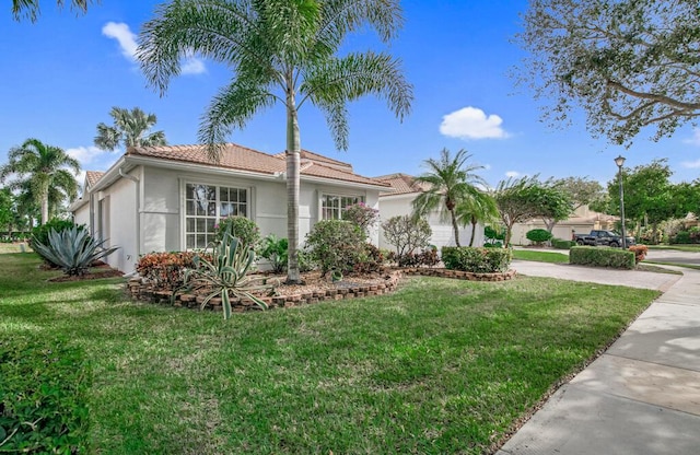 view of front of property with a front yard