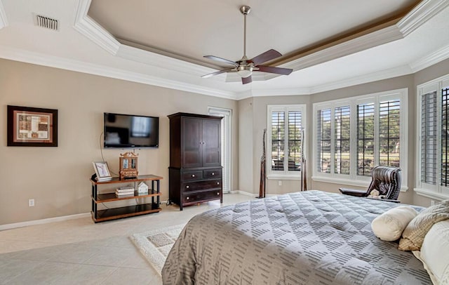 bedroom featuring a raised ceiling, ceiling fan, ornamental molding, and light tile patterned flooring