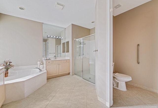 full bathroom with plus walk in shower, tile patterned flooring, vanity, and toilet