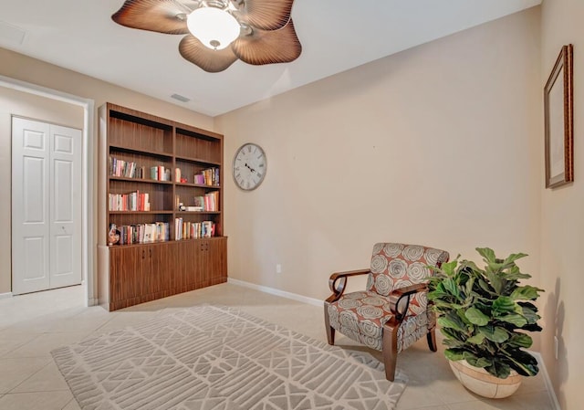 living area with light tile patterned floors