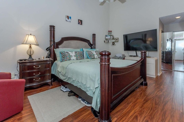 bedroom featuring dark hardwood / wood-style floors and ceiling fan