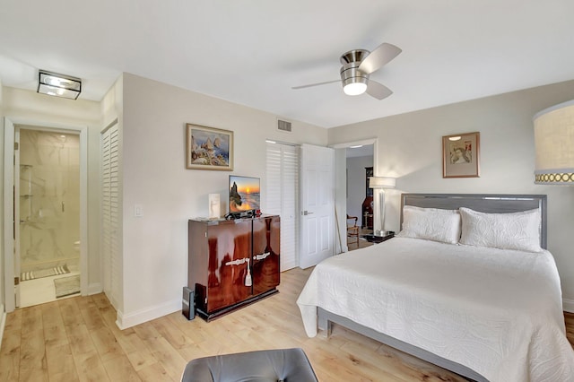 bedroom featuring ensuite bath, ceiling fan, and light hardwood / wood-style flooring