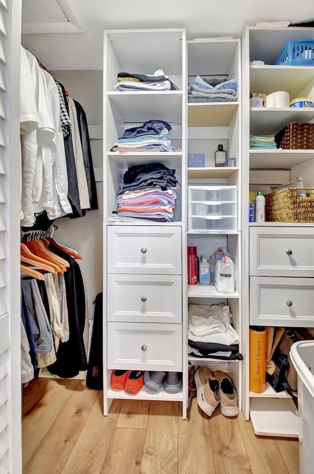 spacious closet featuring light wood-type flooring