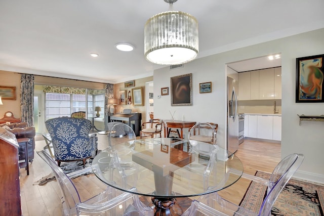 dining area featuring light hardwood / wood-style flooring