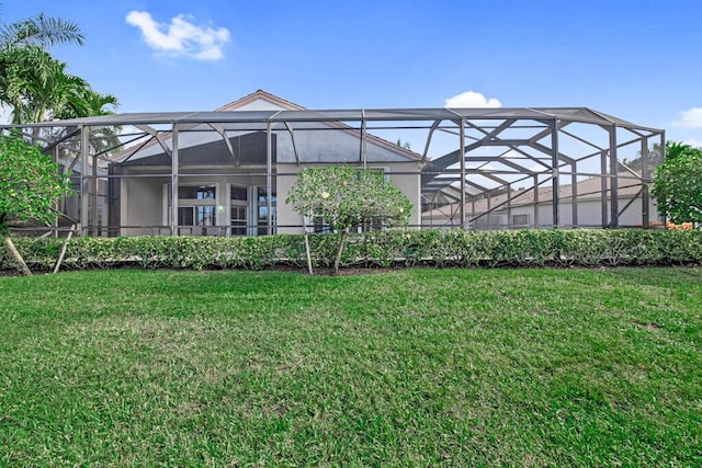 exterior space with a yard and a lanai