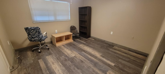 unfurnished office featuring dark hardwood / wood-style flooring